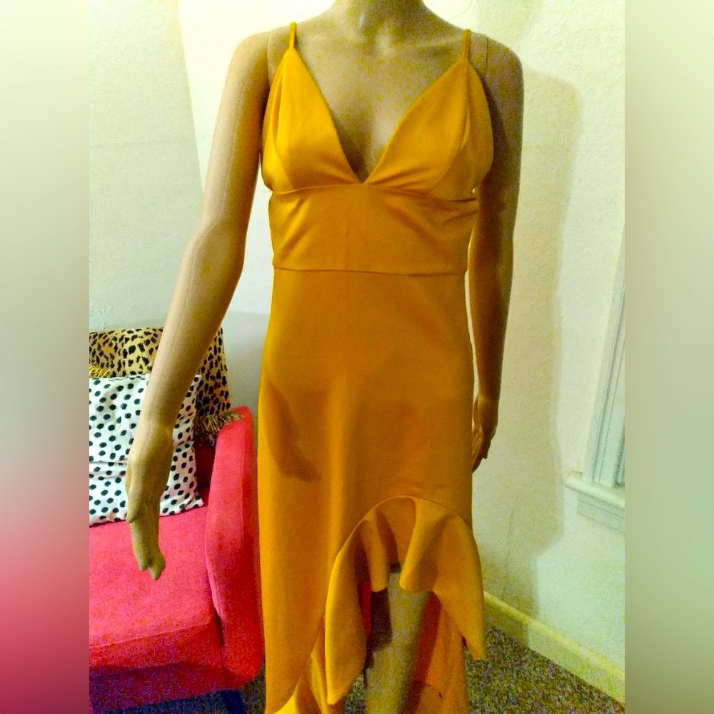 Golden yellow satin dress. Adjustable straps with a ruffle asymmetrical flare